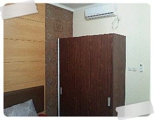 Indekost AC Lemari Pakaian Kost Harian Bulanan